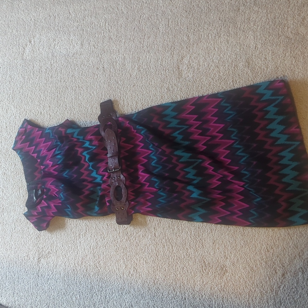 Striking colors on a figure flattering dress with belt